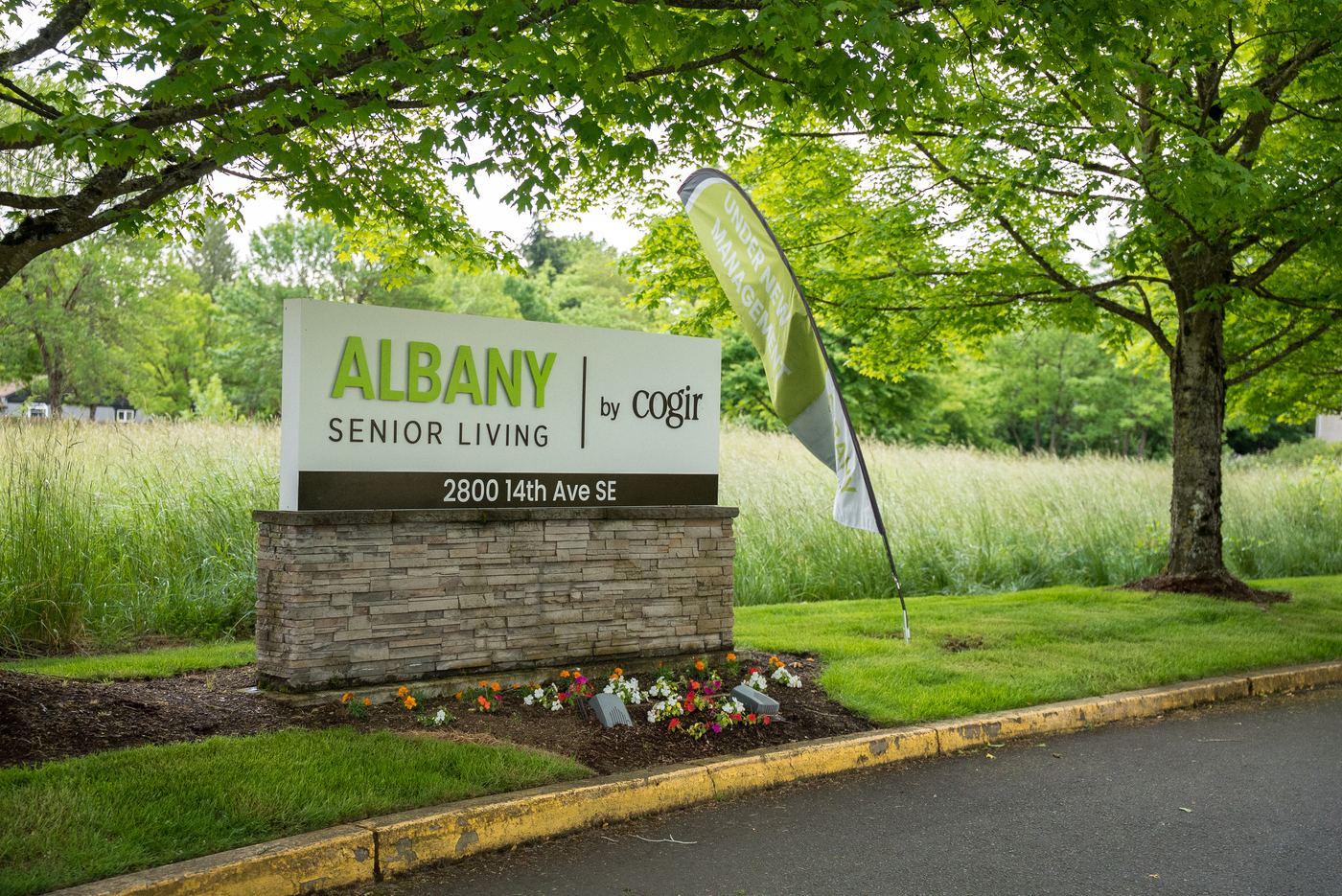 Maintained Albany senior living landscape sign and grounds